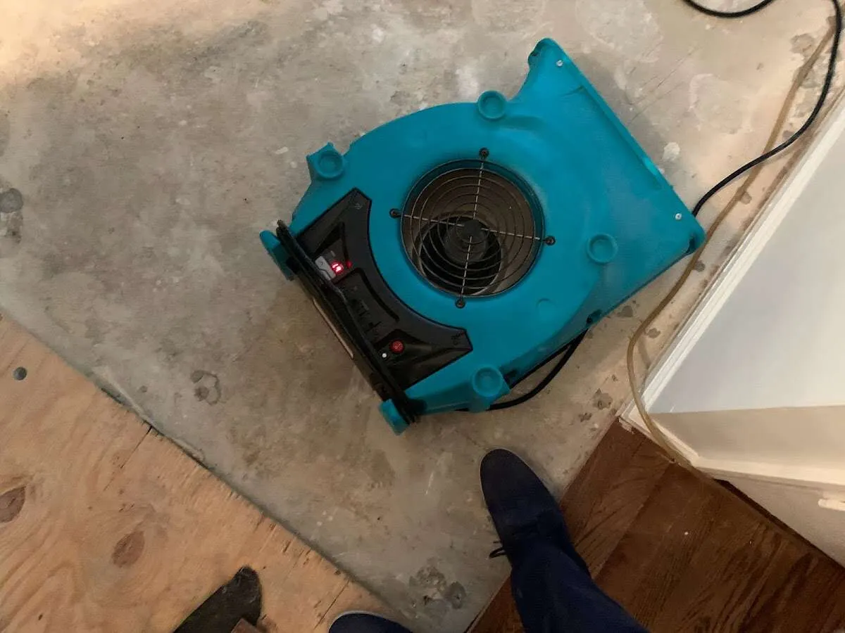Air mover drying subfloor during Leak Detection & Repair in El Sobrante